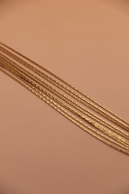 Bracelet Mila – bracelet multirang doré en acier inoxydable avec chaînes fines