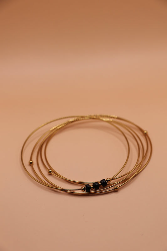 Ensemble de 7 joncs fins en acier inoxydable doré avec perles noires
